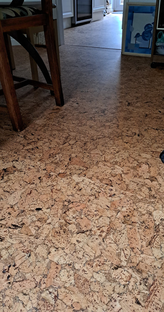A happy customer with their Floating Cork Floor Installation